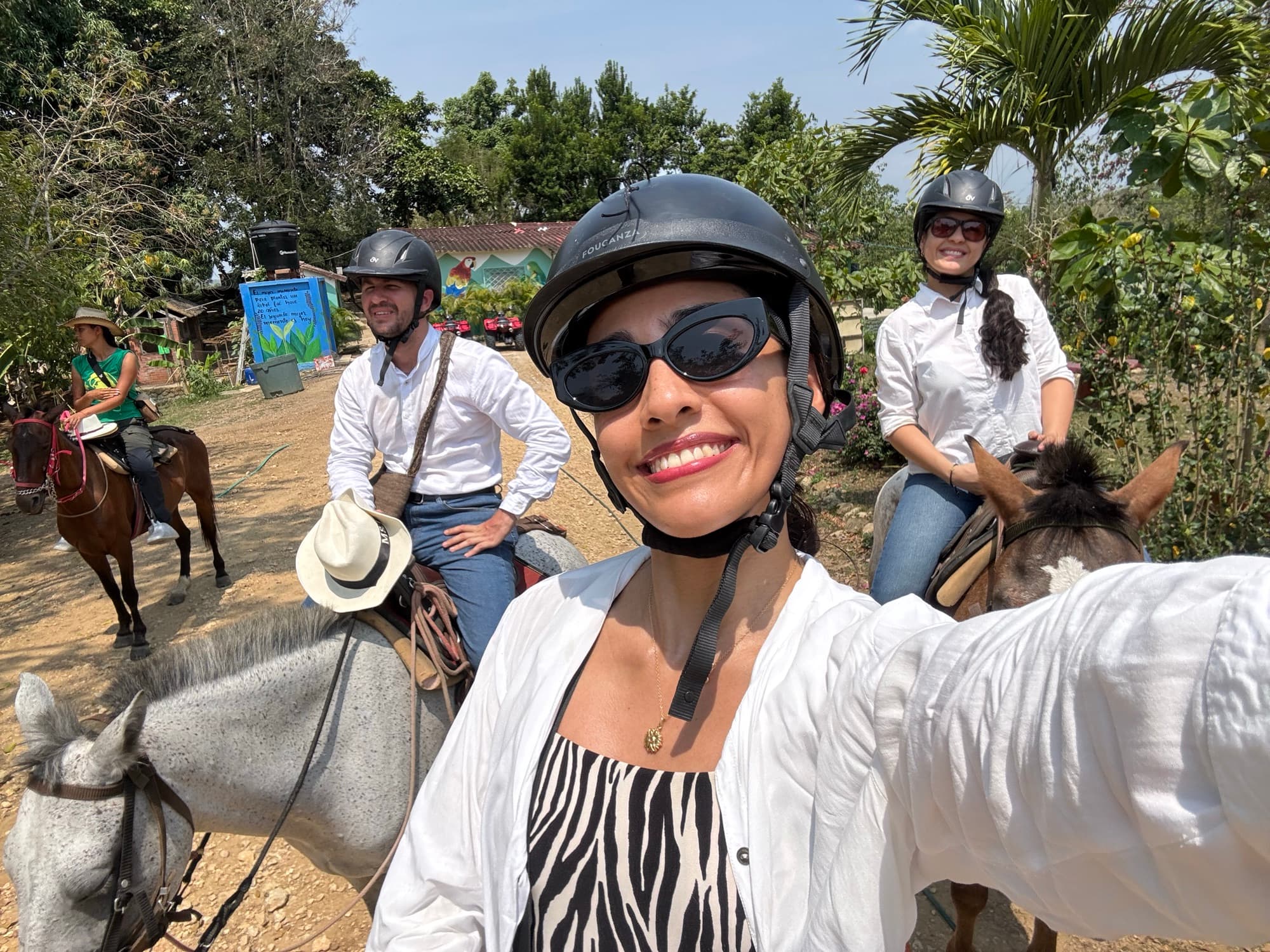 Group horseback ride — visitors riding the project trails